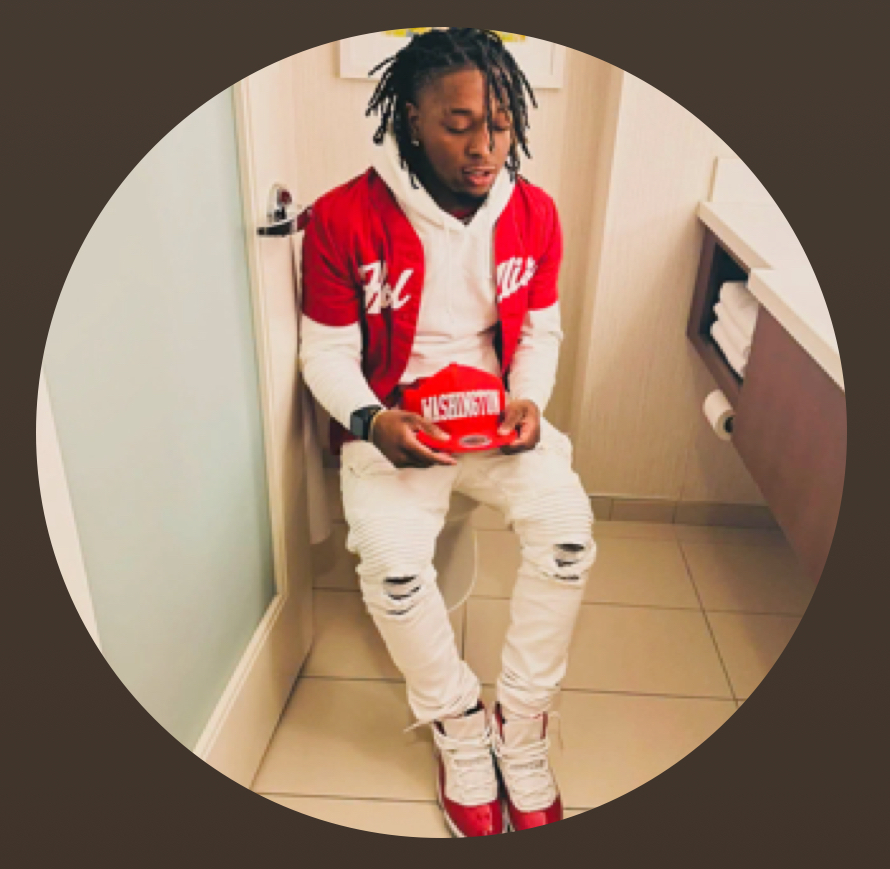 Jaden Codlin wearing a red jersey over a white hoodie